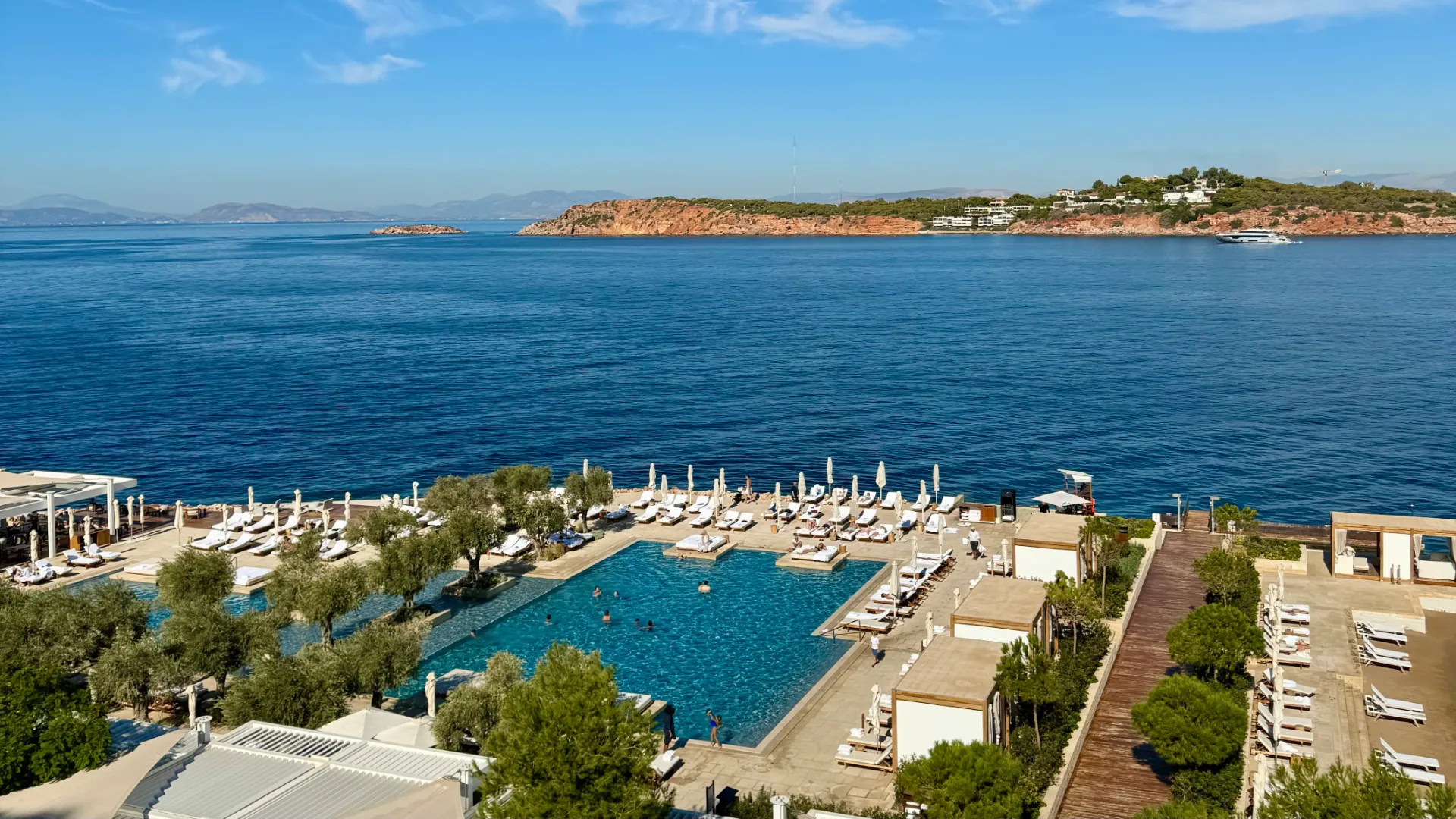 View over the main pool at Nafsika, Four Seasons Astir Palace Hotel Athens